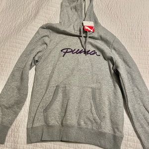Women’s Puma hoodie. Size large. Purple print. Front pocket.